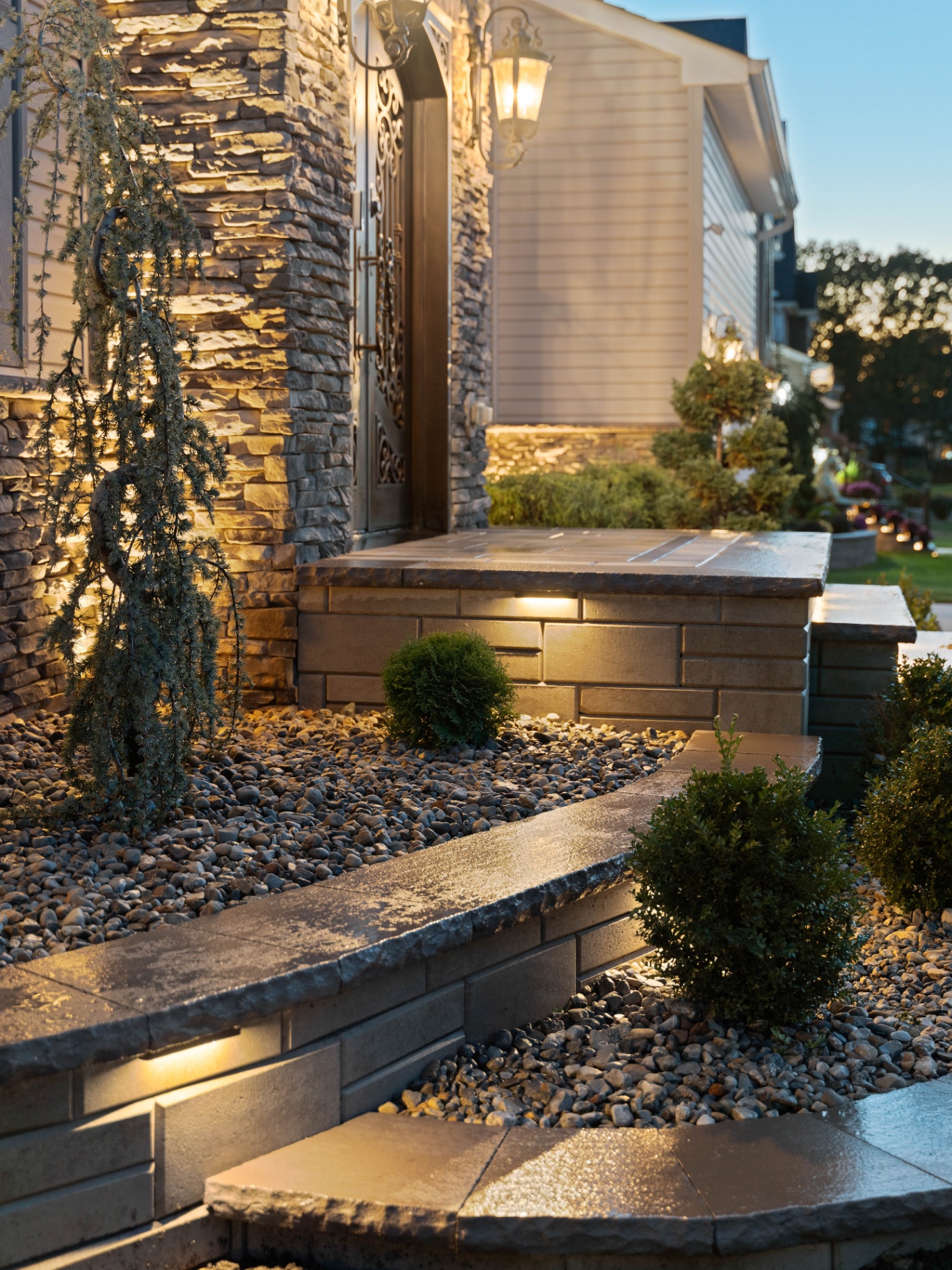 Stone retaining wall built by AG Hardscaping